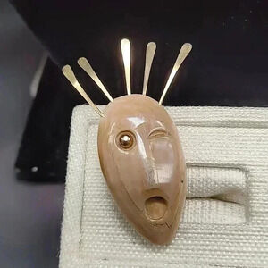 Bad Spirit of the Mountain, Yupik Eskimo, The eye and feather are gold filled